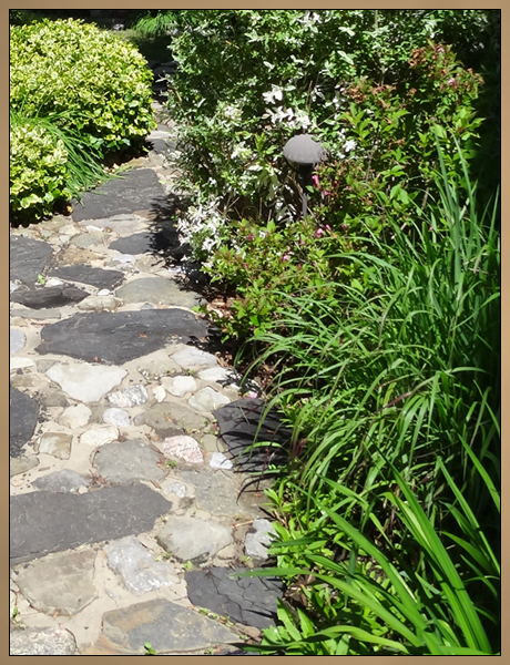 Custom Landscaping Rock Path and Garden Photo