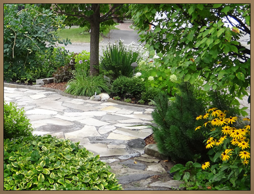 Custom Landscaping With Lighting Daytime Photo